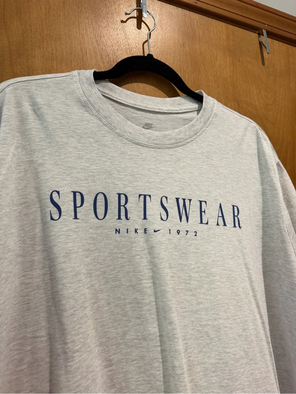 Nike Sportswear Graphic Tee with Navy Logo